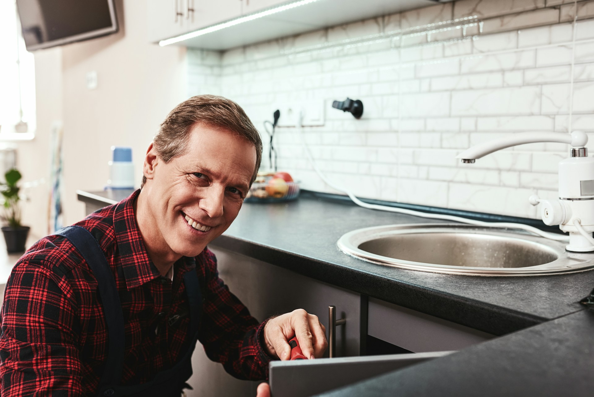 What to Do When Your Garbage Disposal Hums But Won't Turn 1 plumbing service